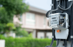 a close up of an an energy-usage meter on a property