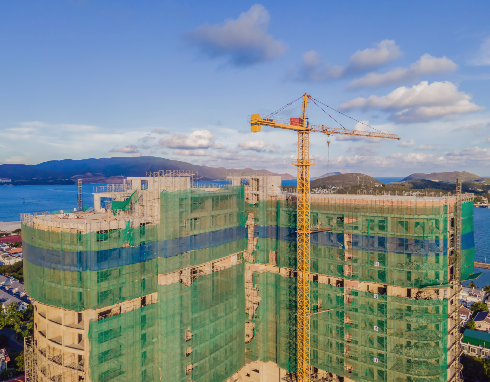 an aerial shot of a commercial construction project on a sunny day